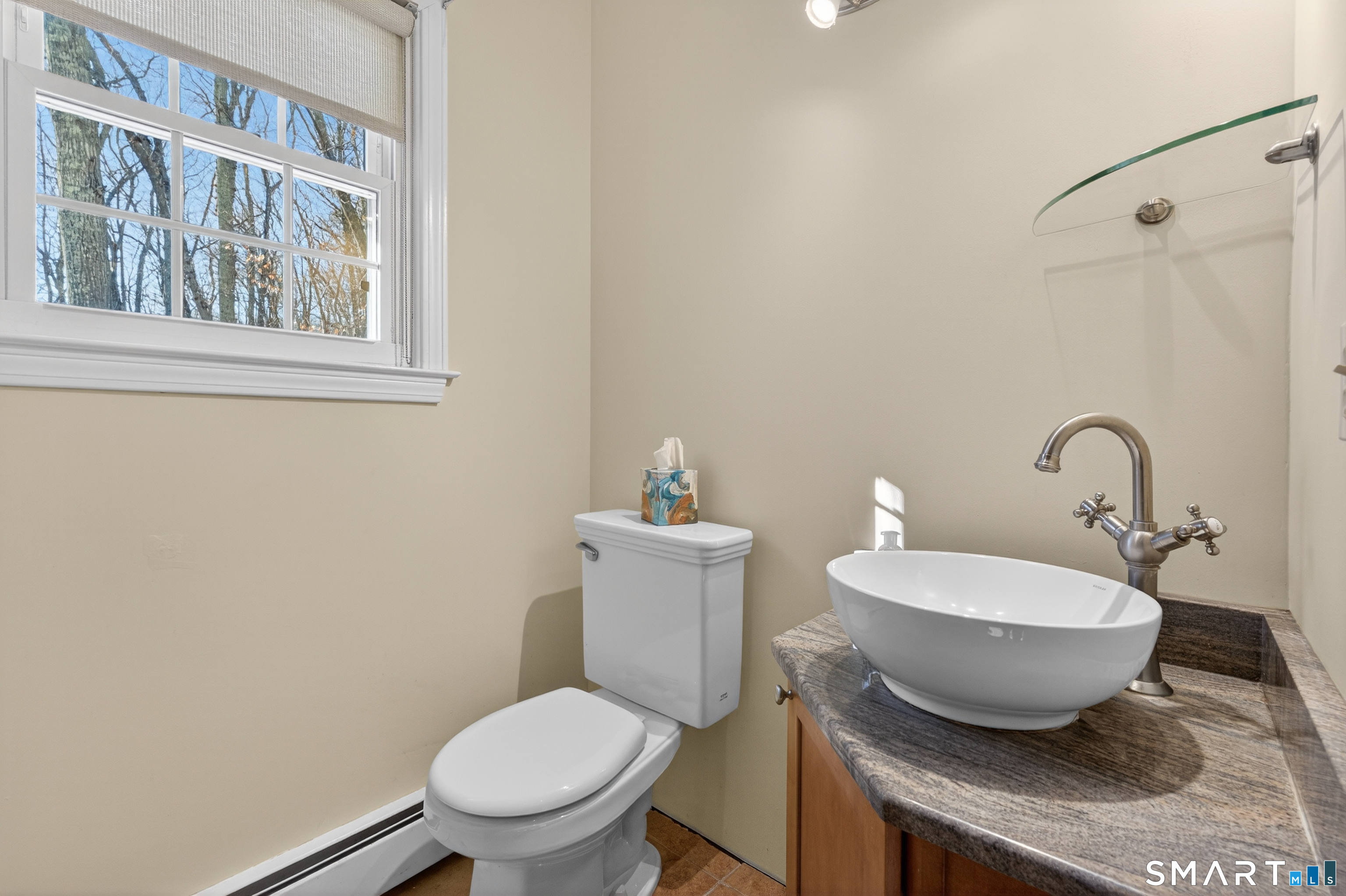 29 Legendary Road East Lyme, CT 06333 - Photo 16 of 36 a bathroom with a toilet and a sink