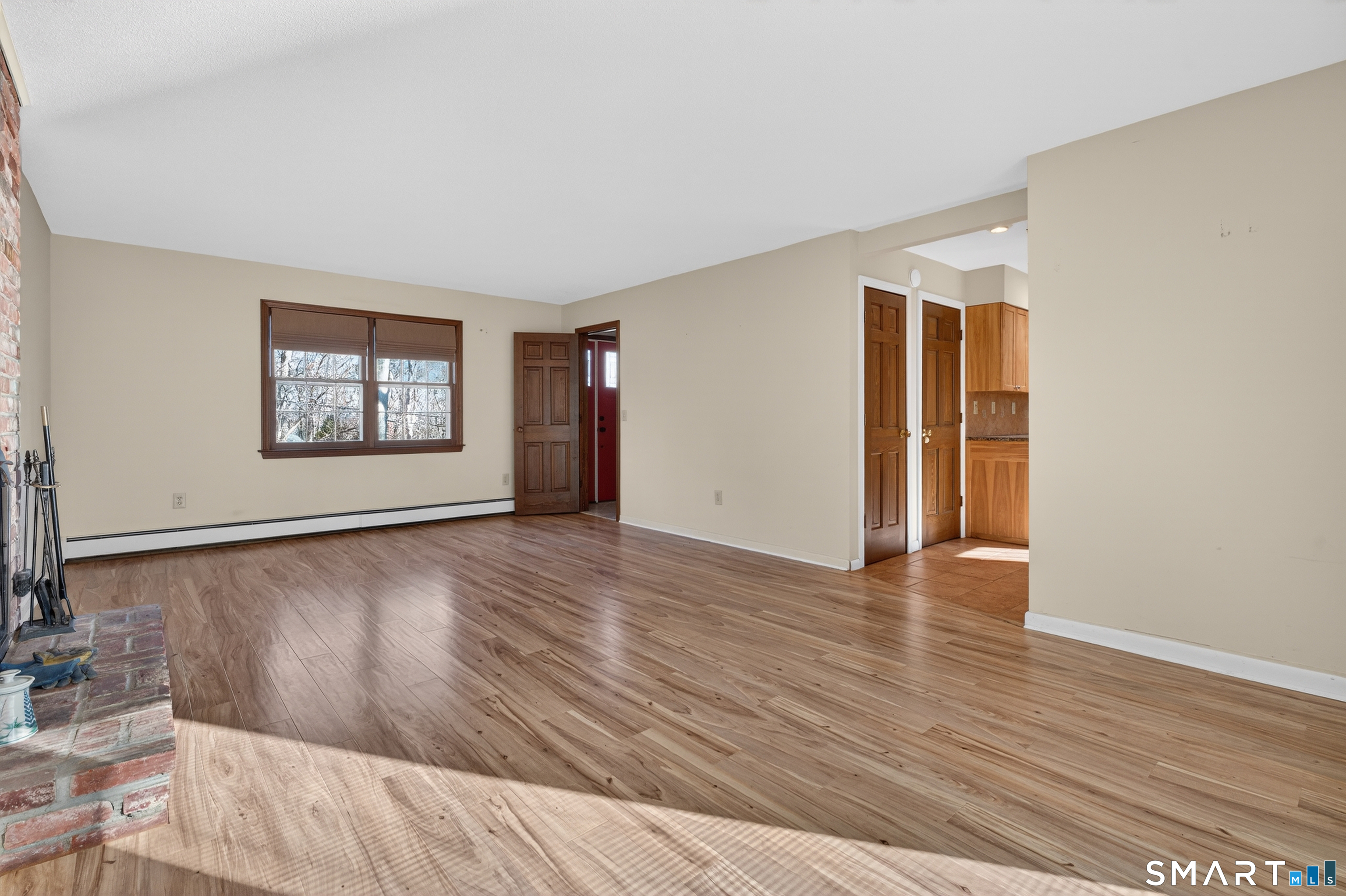 29 Legendary Road East Lyme, CT 06333 - Photo 20 of 36 an empty room with wooden floor and windows
