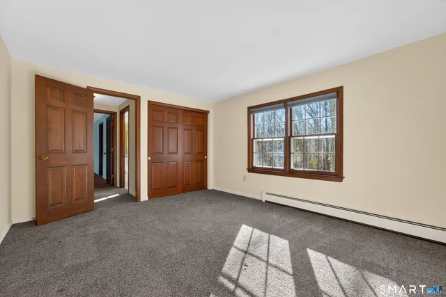 an empty room with windows