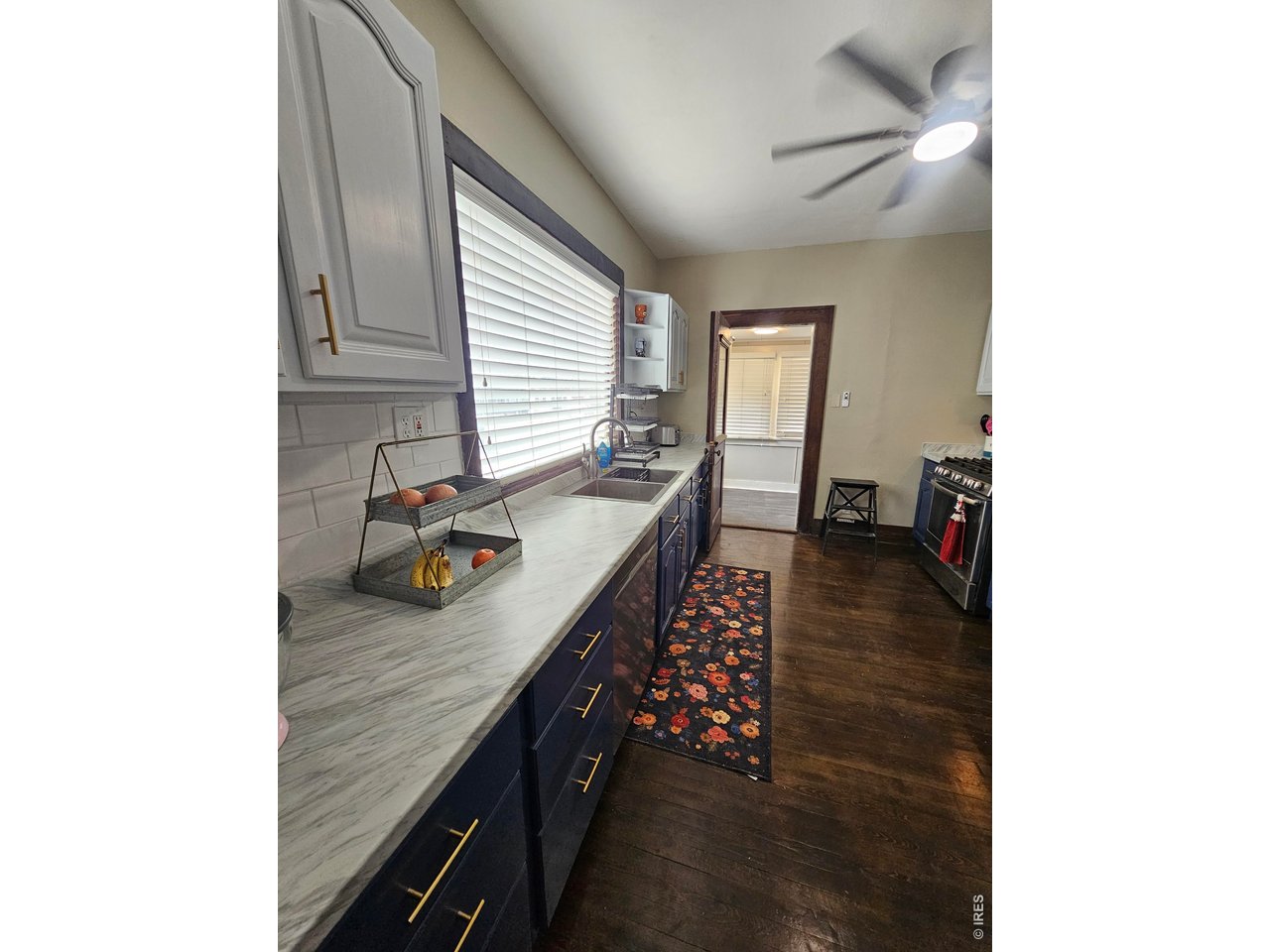 704 South 3rd Avenue Sterling, CO 80751 - Photo 11 of 33 Updated kitchen with beautiful countertops
