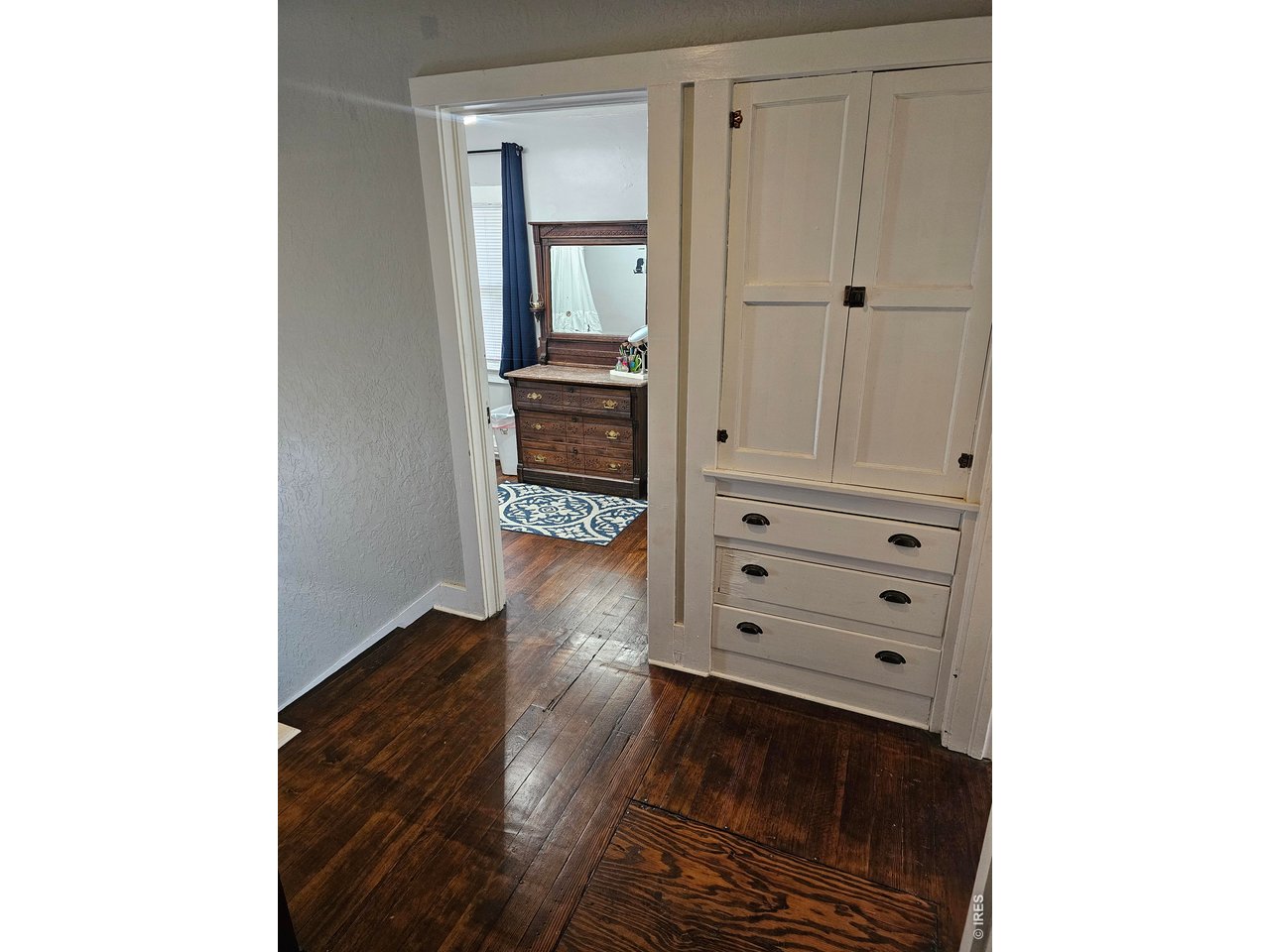 704 South 3rd Avenue Sterling, CO 80751 - Photo 15 of 33 Upstairs landing with built-in located outside of the bathroom