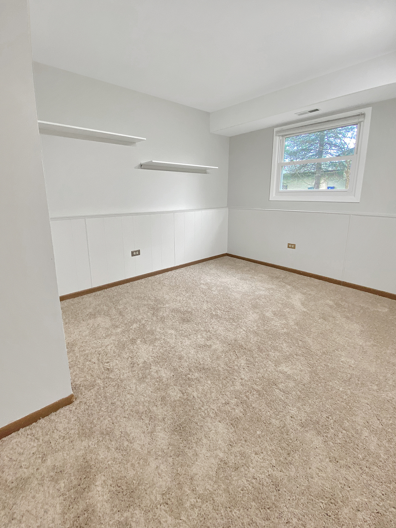 2080 Savannah Road Elgin, IL 60123 - Photo 9 of 17 a view of an empty room with a window