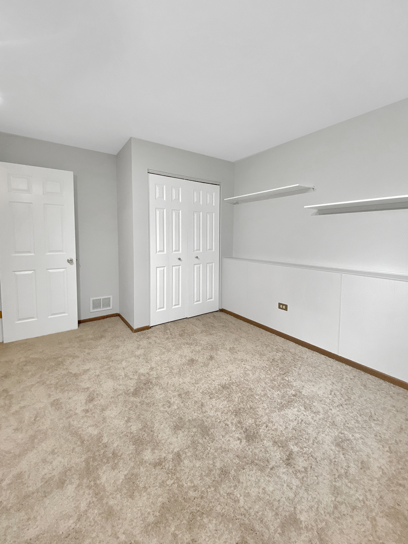 2080 Savannah Road Elgin, IL 60123 - Photo 10 of 17 a view of an empty room and entryway