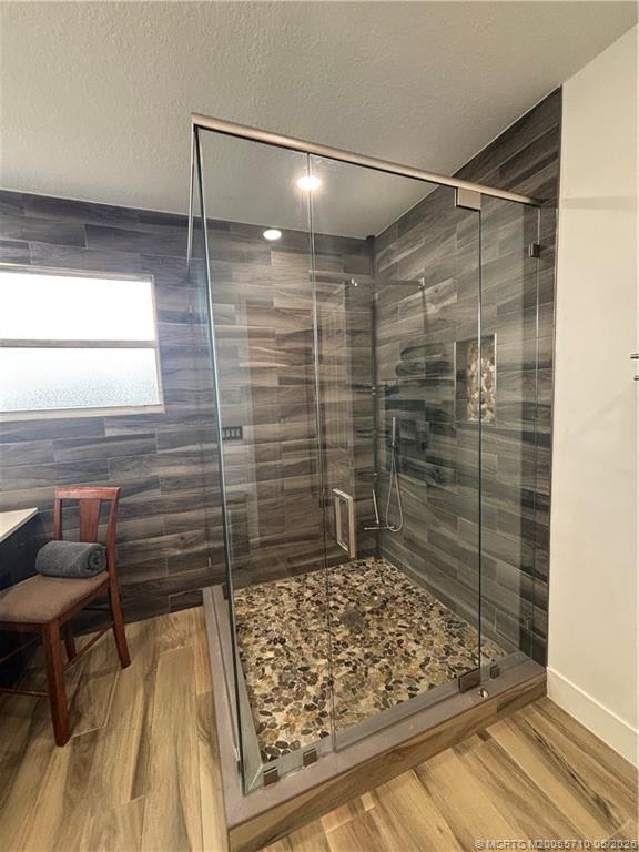 262 Southwest Walking Path, Unit 262 Stuart, FL 34997 - Photo 28 of 39 a bathroom with a shower