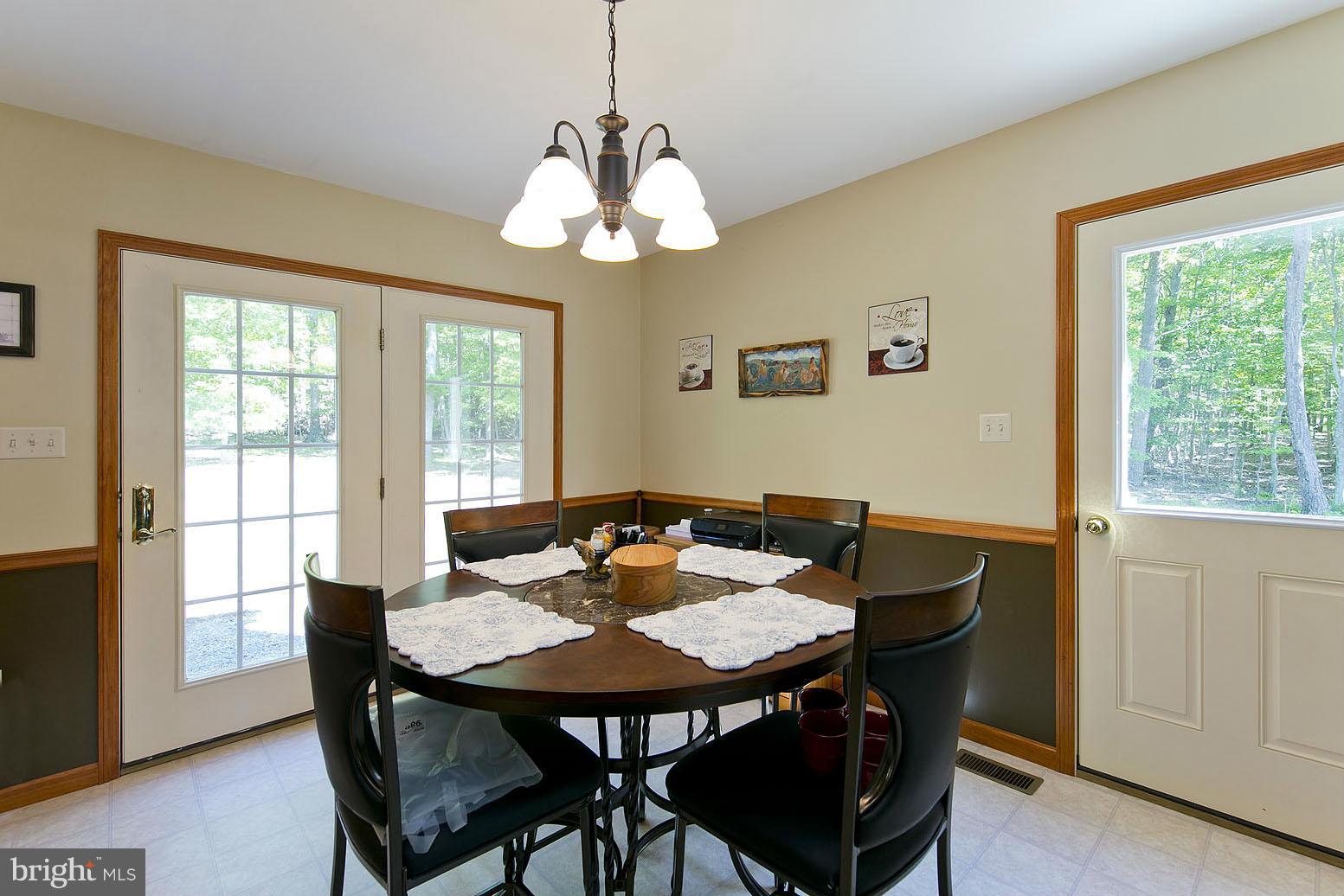 2000 South Pifer Road Star Tannery, VA 22654 - Photo 3 of 12 a view of a dining room with furniture window and wooden floor