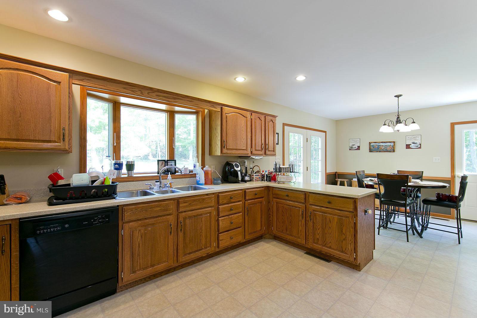 2000 South Pifer Road Star Tannery, VA 22654 - Photo 4 of 12 a kitchen with lots of counter top space and dining table