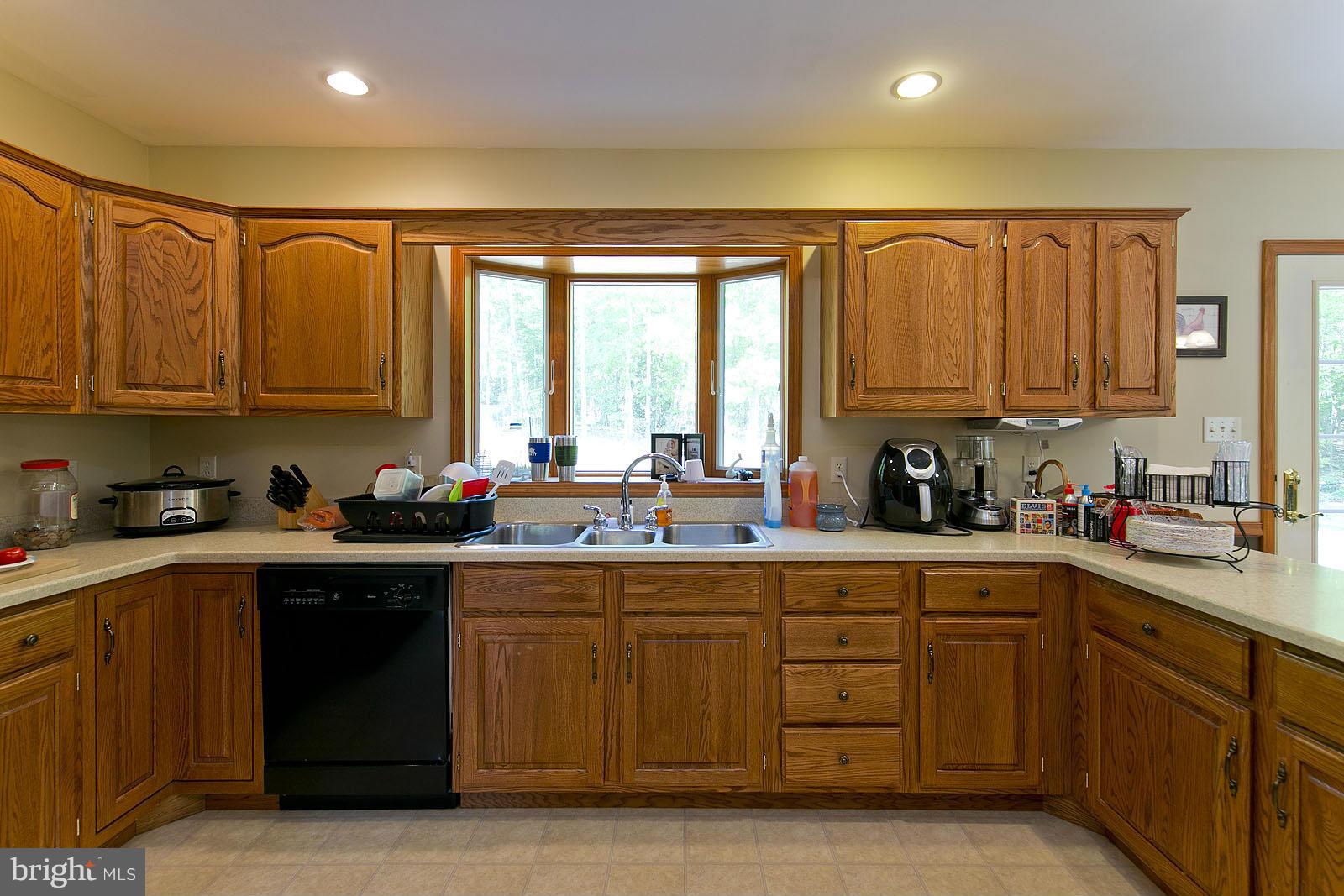 2000 South Pifer Road Star Tannery, VA 22654 - Photo 5 of 12 a kitchen with a sink a window and cabinets