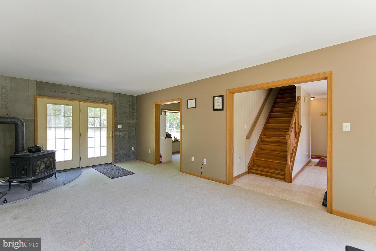 2000 South Pifer Road Star Tannery, VA 22654 - Photo 6 of 12 a view of a livingroom with furniture and staircase