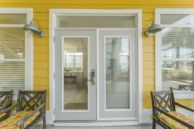 a kitchen with stainless steel appliances granite countertop a stove refrigerator and microwave