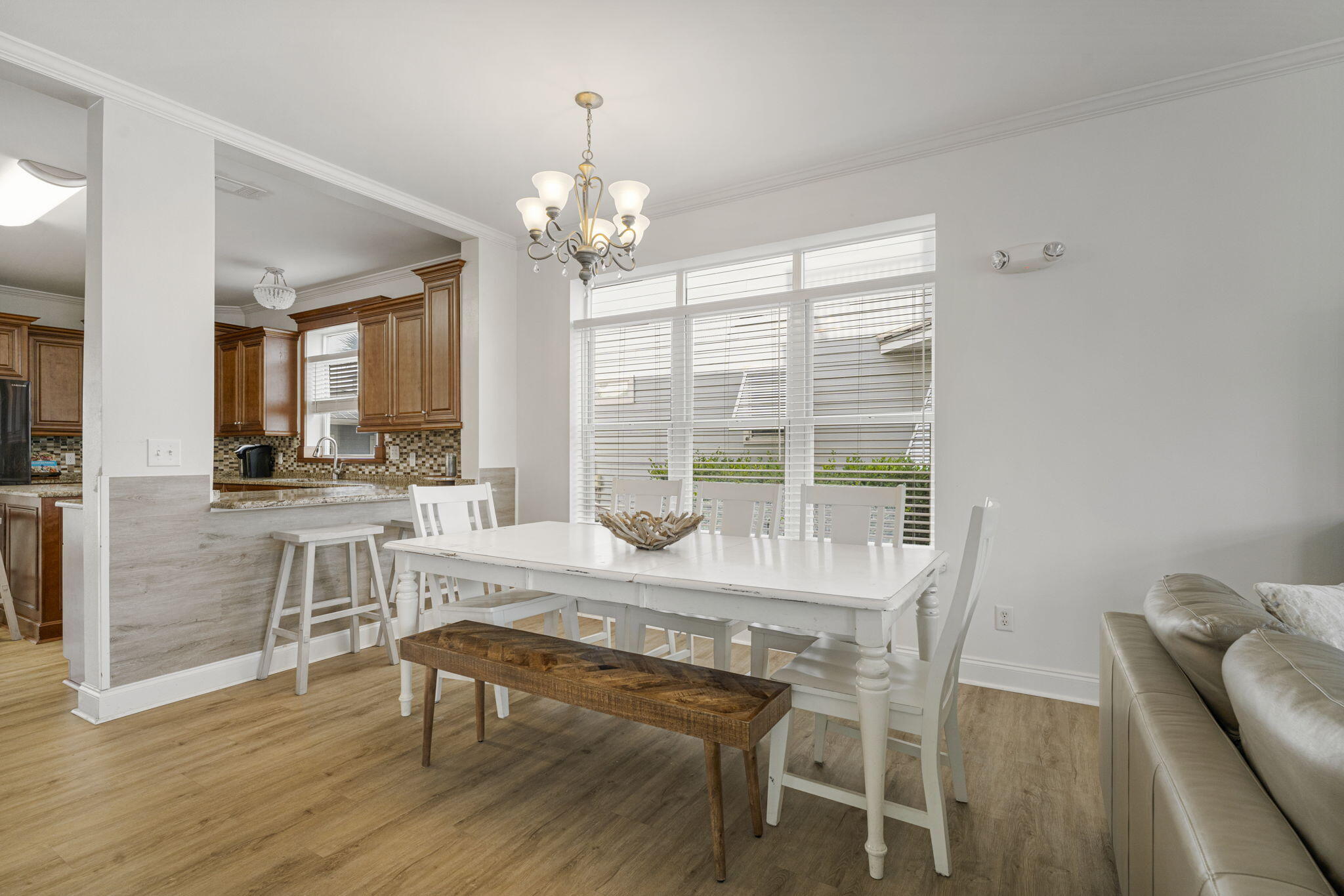 80 Shirah Street Destin, FL 32541 - Photo 21 of 66 a view of a dining room with furniture window and wooden floor