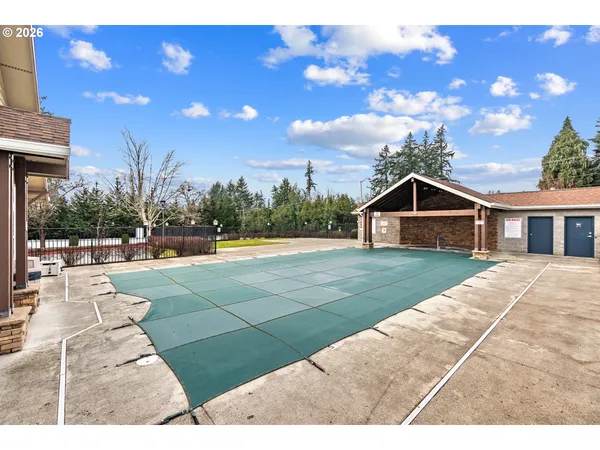 a view of house with yard