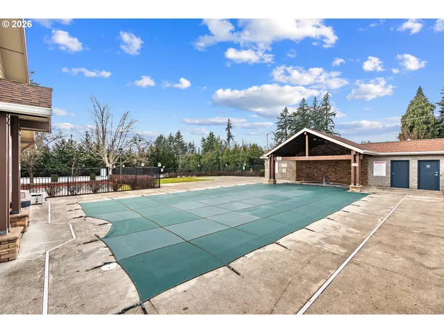 a view of house with yard
