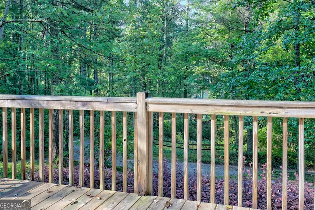a view of a lake with houses in the back