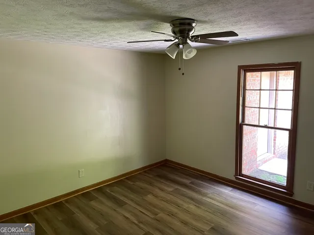 an empty room with a window