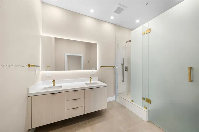 a bathroom with a shower and toilet