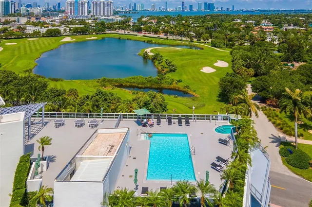 a view of a backyard with a garden and plants