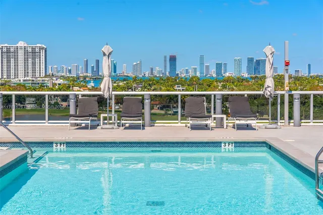 a view of a swimming pool with a slide