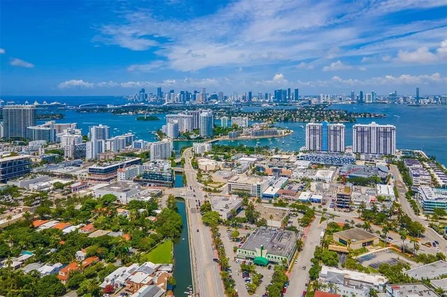 a view of a lake with a big yard