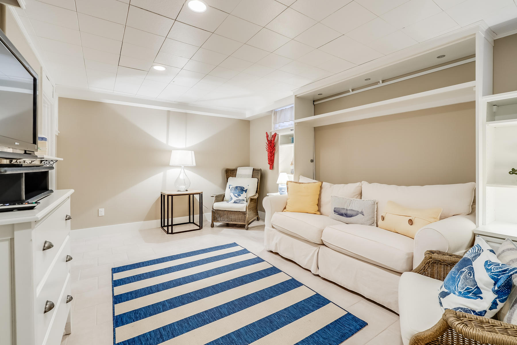31 Parker Road Osterville, MA 02655 - Photo 13 of 24 a living room with furniture and a flat screen tv