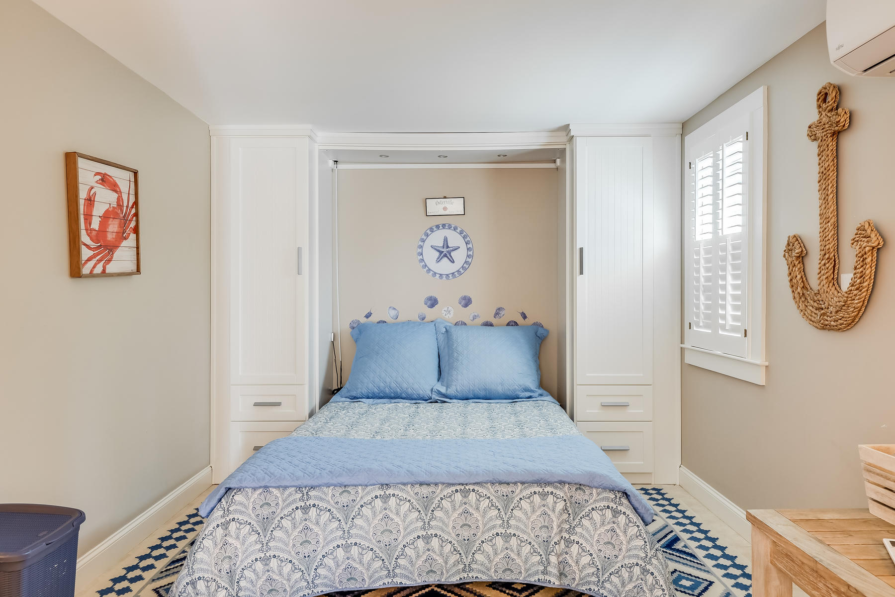 31 Parker Road Osterville, MA 02655 - Photo 14 of 24 a bedroom with a large bed and a window
