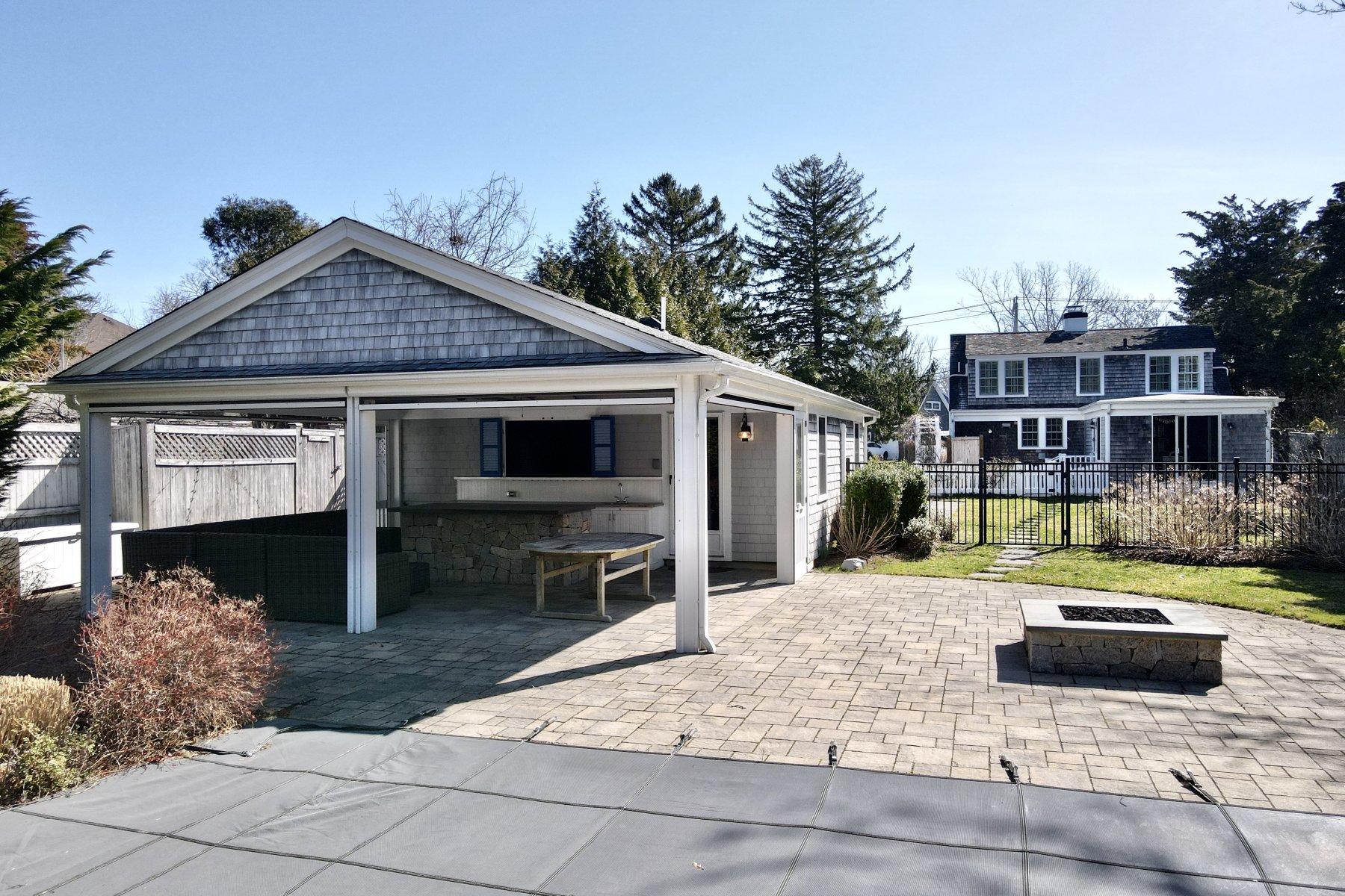 31 Parker Road Osterville, MA 02655 - Photo 17 of 24 a view of a house with backyard and sitting area