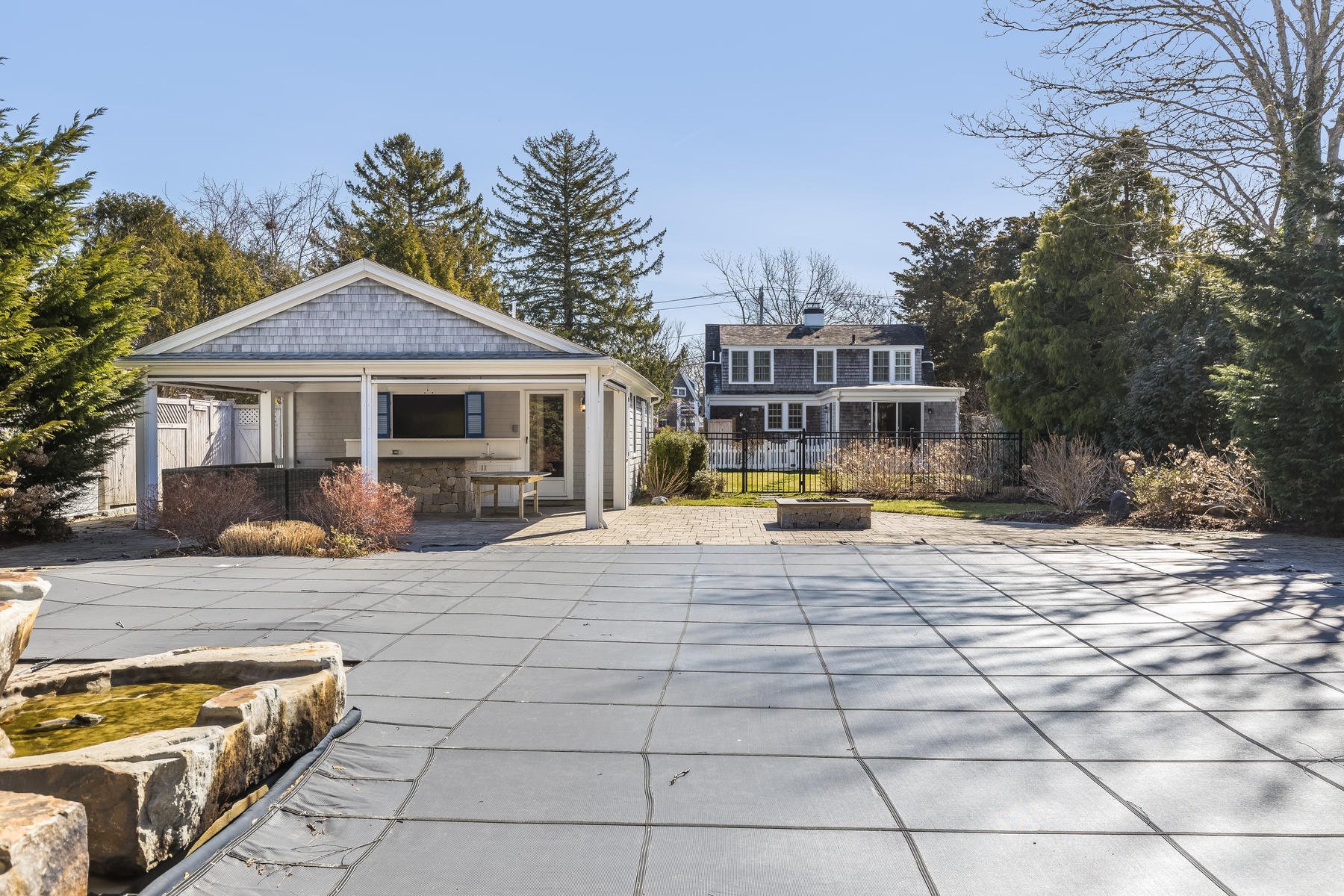 31 Parker Road Osterville, MA 02655 - Photo 18 of 24 a view of a house with swimming pool and sitting area