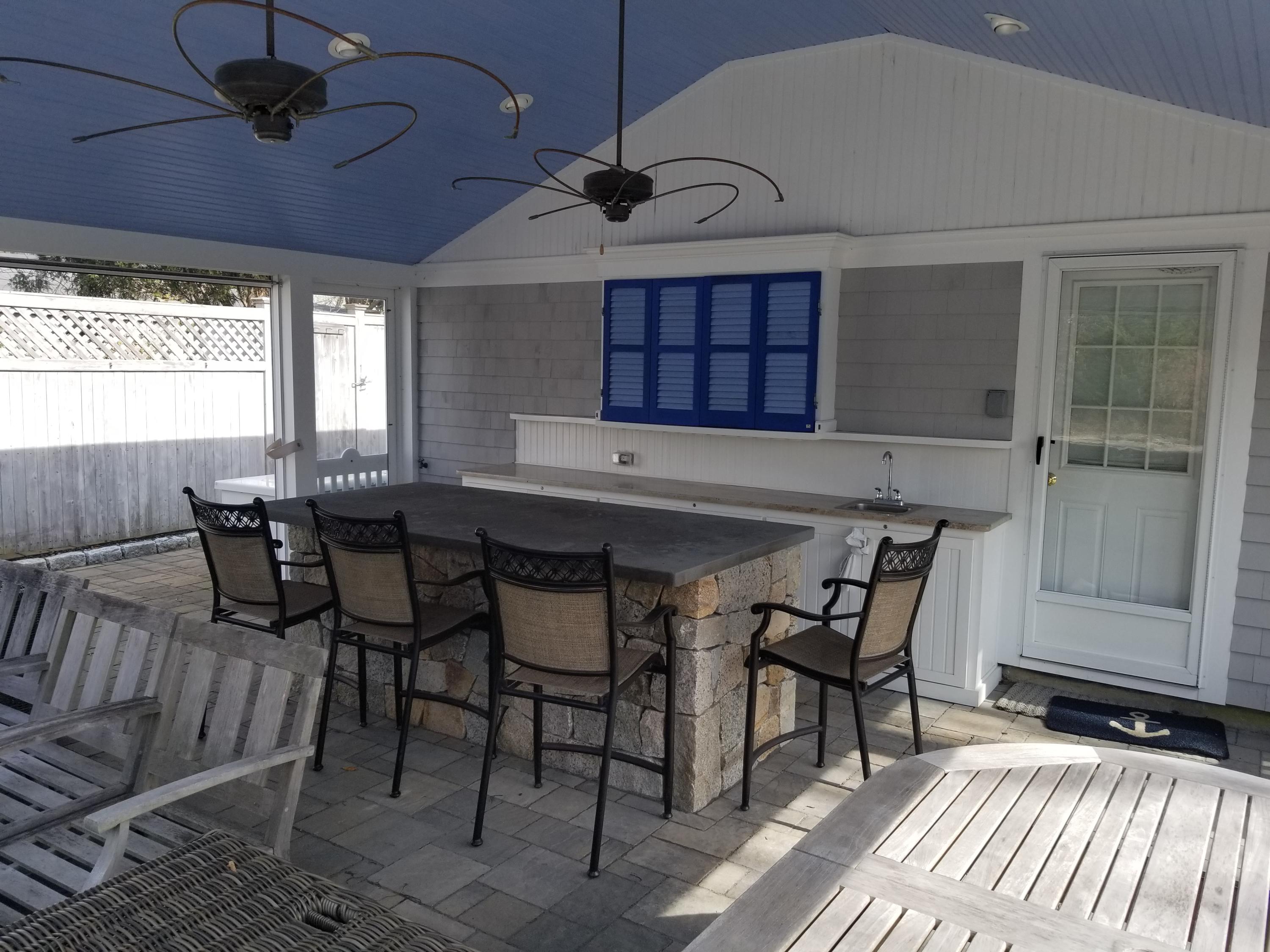 31 Parker Road Osterville, MA 02655 - Photo 3 of 24 a view of a dining room with furniture and window