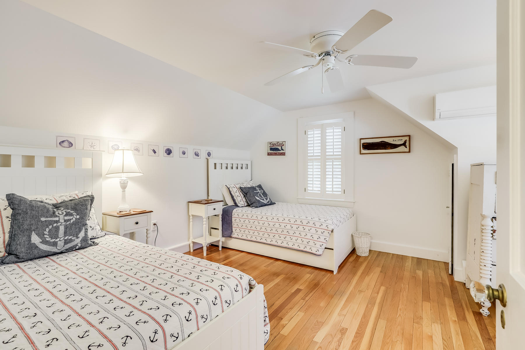 31 Parker Road Osterville, MA 02655 - Photo 10 of 24 a bedroom with a bed and window