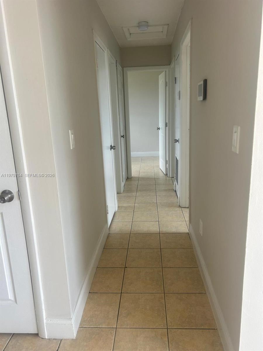 28511 Southwest 147th Avenue Homestead, FL 33033 - Photo 11 of 19 a bathroom with a sink and a mirror