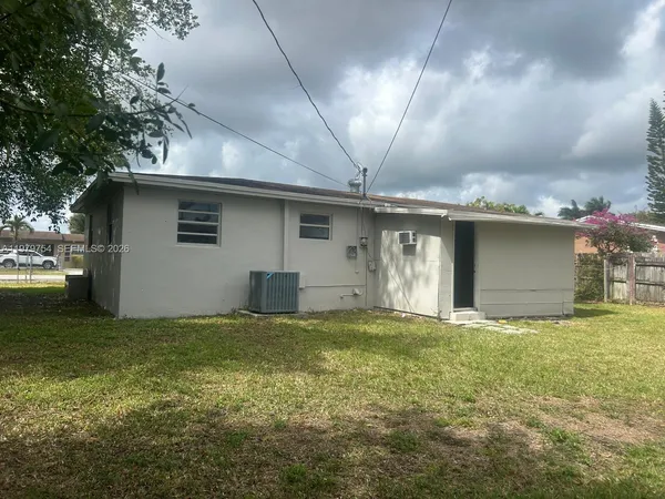 a view of a house with a garage