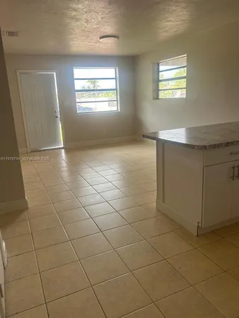 a view of kitchen and window