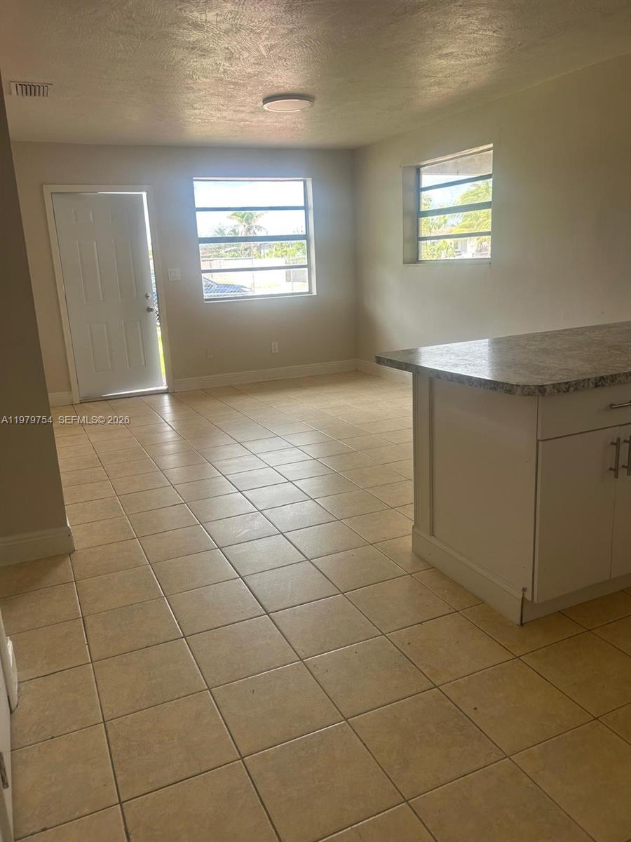 28511 Southwest 147th Avenue Homestead, FL 33033 - Photo 9 of 19 a view of kitchen and window