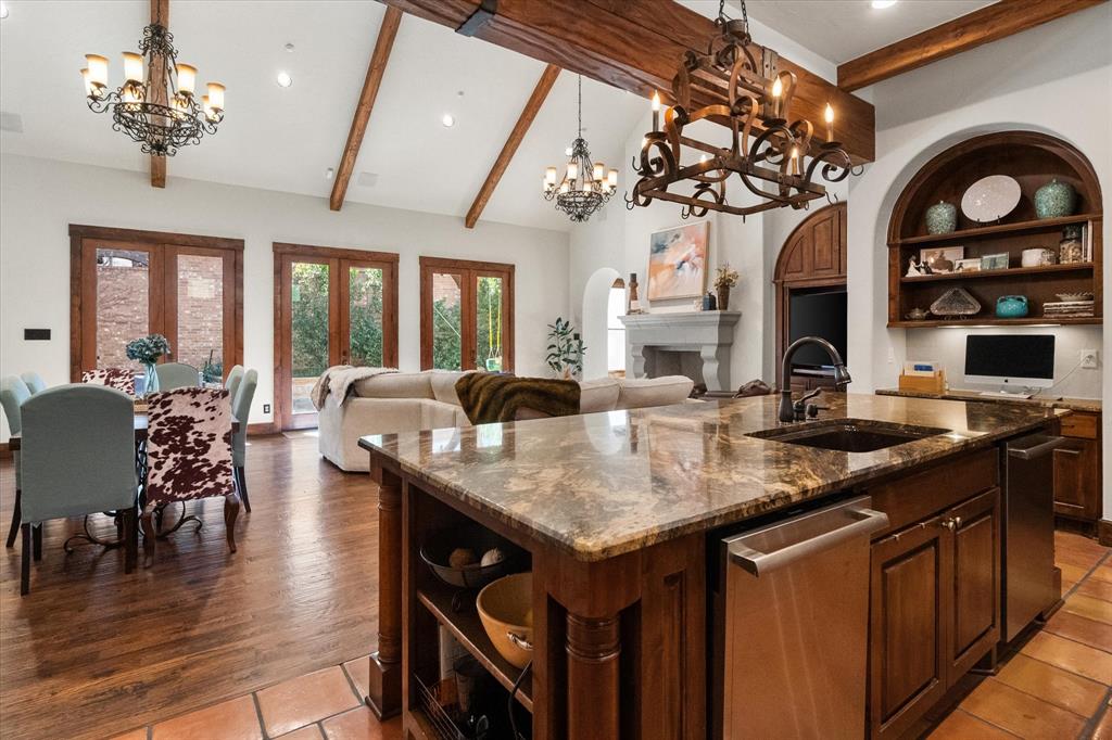 920 Nottingham Road Keller, TX 76248 - Photo 11 of 38 a kitchen with a table chairs and a chandelier