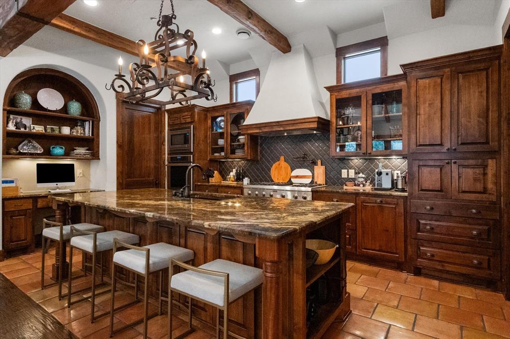 920 Nottingham Road Keller, TX 76248 - Photo 13 of 38 a kitchen with stainless steel appliances granite countertop a stove and cabinets