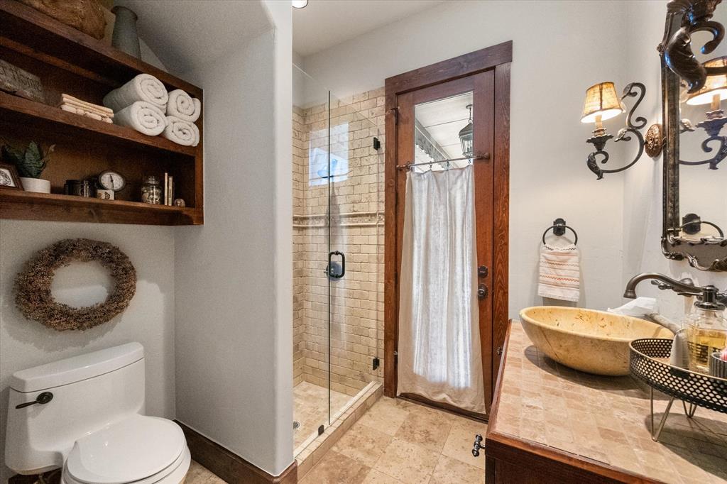 920 Nottingham Road Keller, TX 76248 - Photo 21 of 38 a bathroom with a toilet a sink and mirror