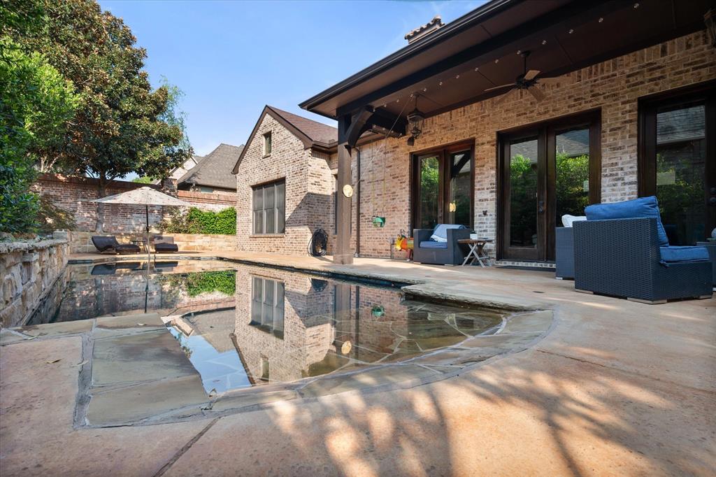 920 Nottingham Road Keller, TX 76248 - Photo 35 of 38 a view of a house with pool and chairs