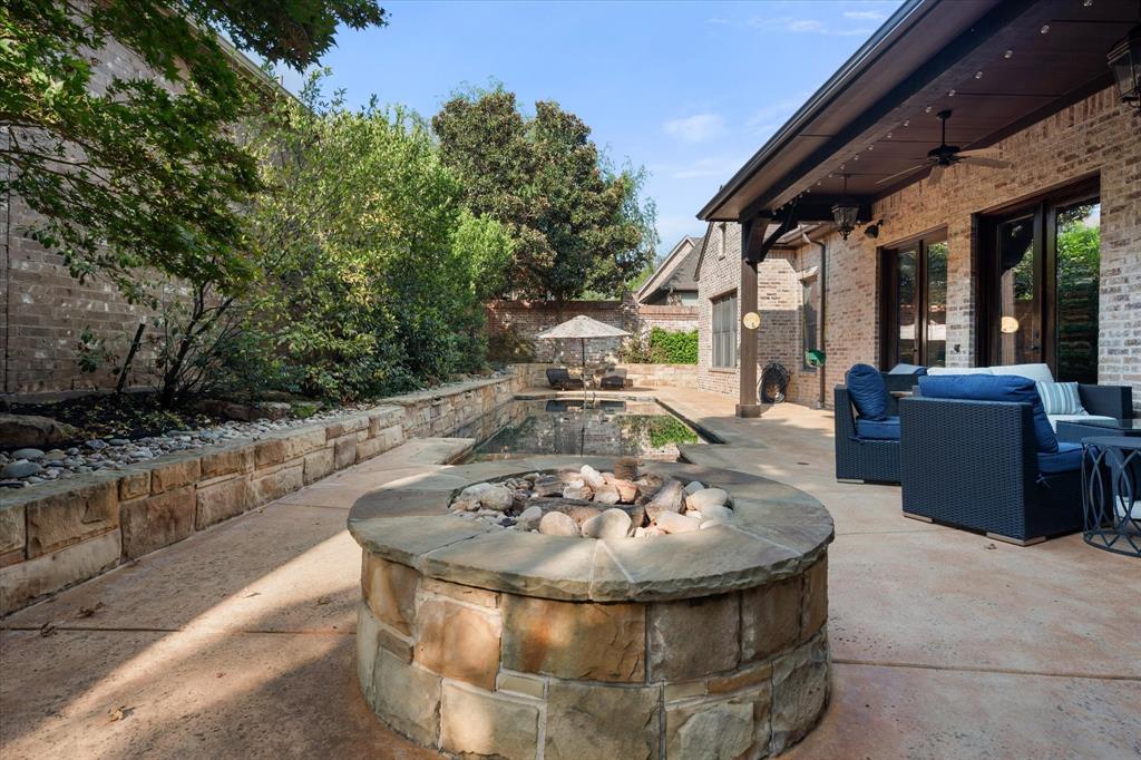 920 Nottingham Road Keller, TX 76248 - Photo 36 of 38 a view of a couches and dinning table and in the patio