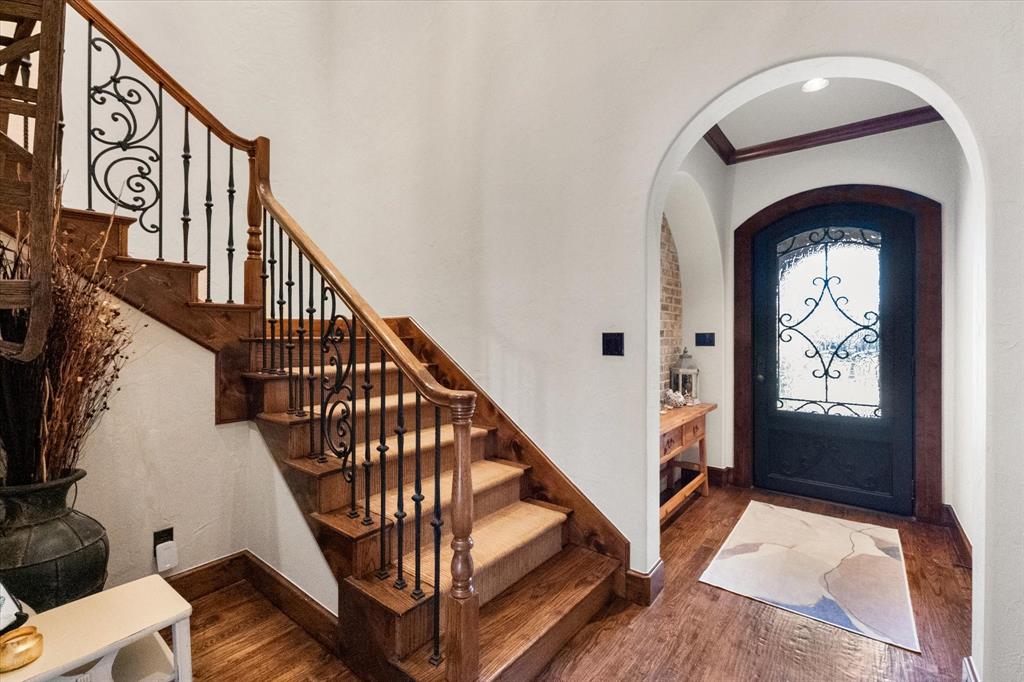 920 Nottingham Road Keller, TX 76248 - Photo 4 of 38 a view of entryway with wooden floor and stairs