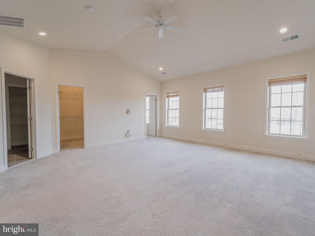 22595 Windsor Locks Square Ashburn, VA 20148 - Photo 44 of 56 an empty room with windows and closet