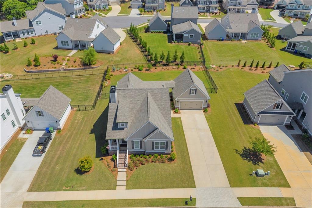 943 Clubside Drive Monroe, GA 30655 - Photo 20 of 24 an aerial view of residential houses with outdoor space