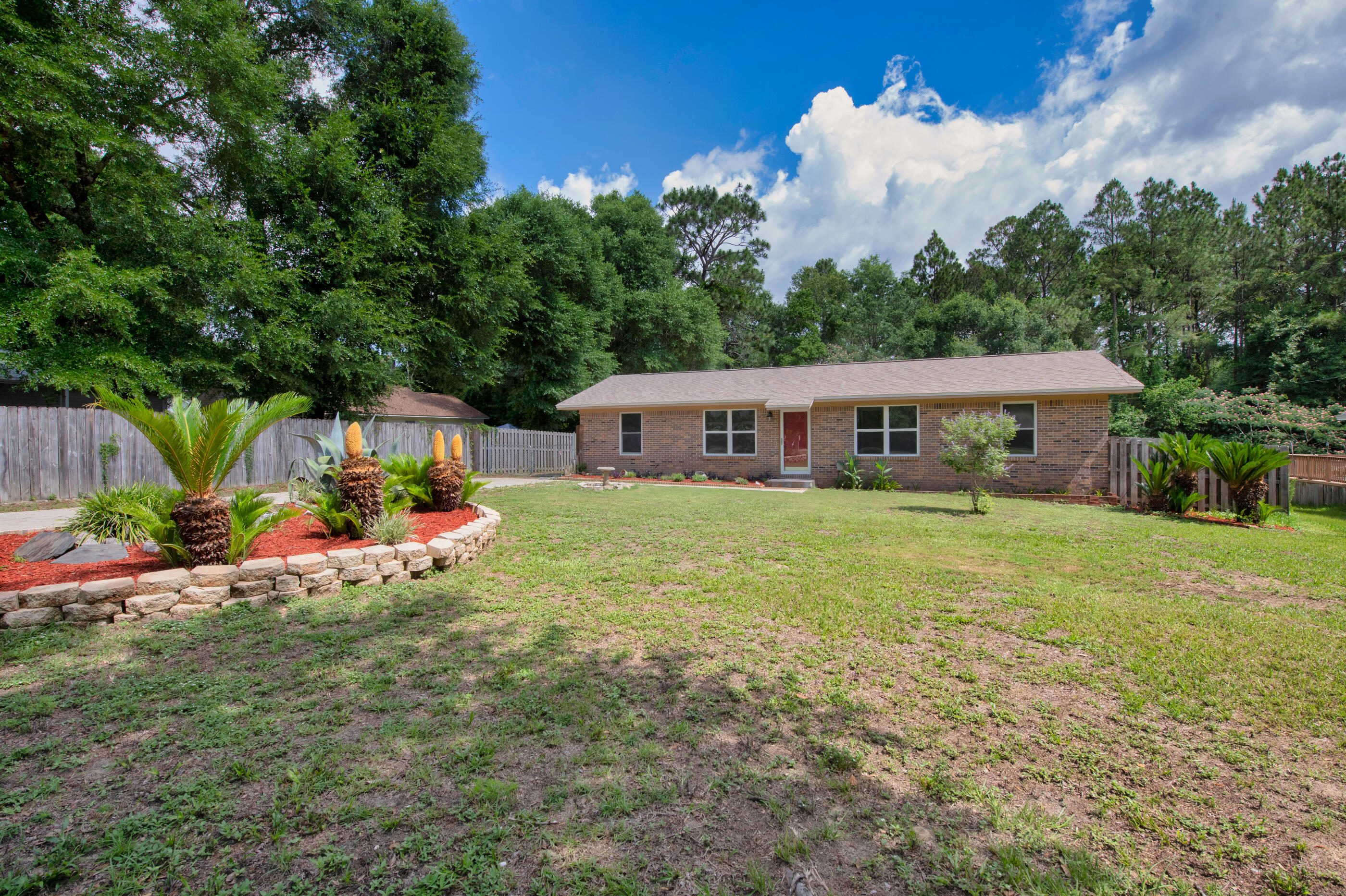 2909 Aplin Road Crestview, FL 32539 - Photo 2 of 29 a view of a house with a yard