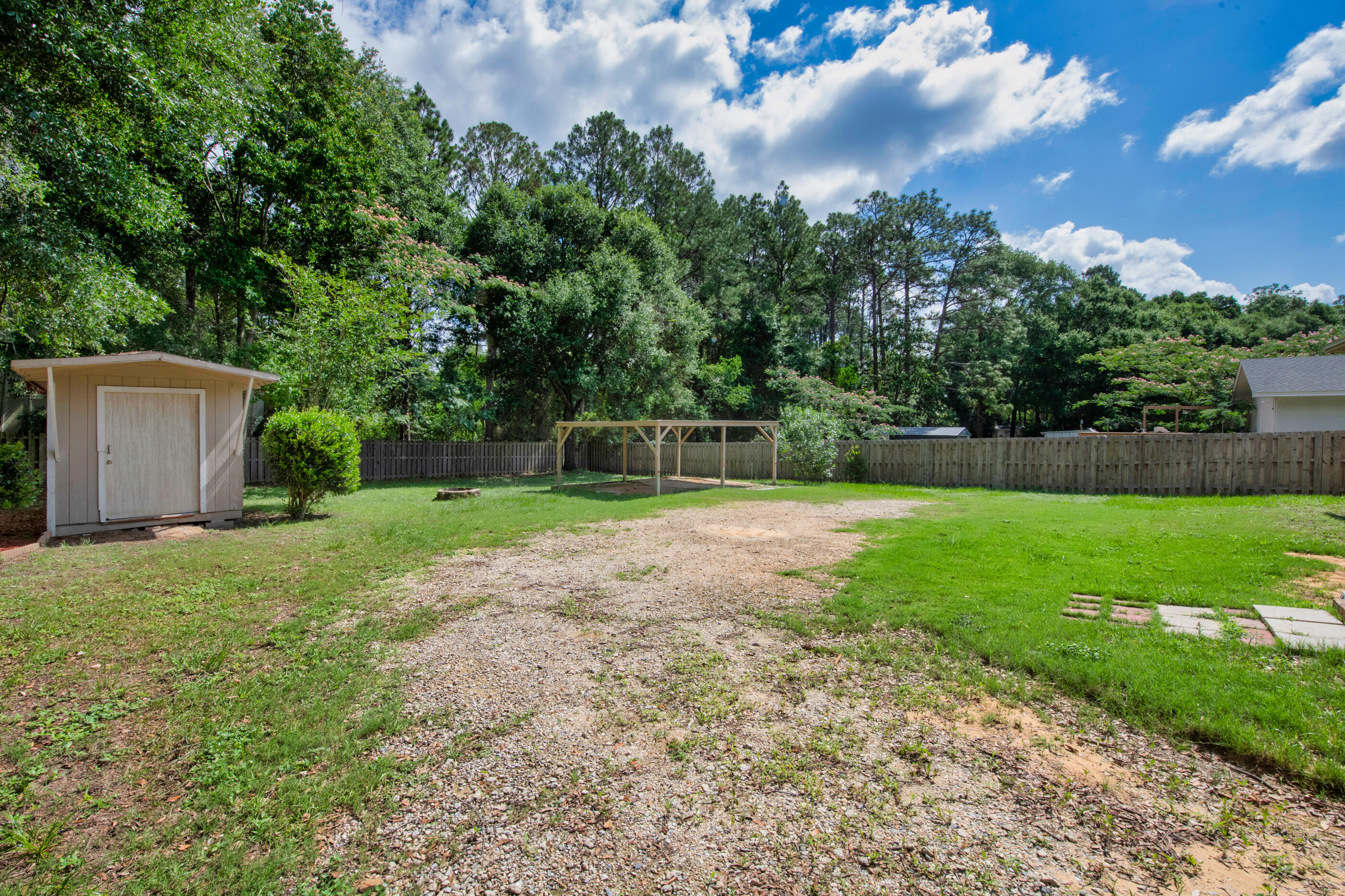 2909 Aplin Road Crestview, FL 32539 - Photo 27 of 29 a view of a yard with a house in the background