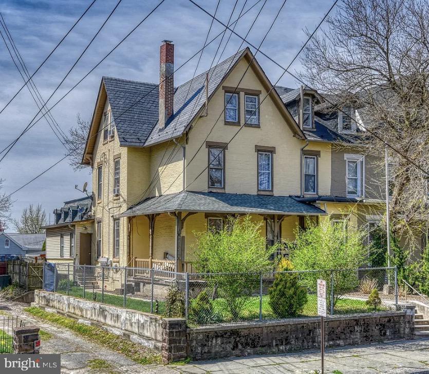 640 North 3rd Street, Unit 3 Reading, PA 19601 - Photo 1 of 4 a front view of a house with garden