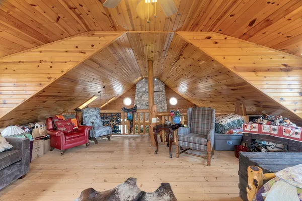 a view of a storage room with wooden floor