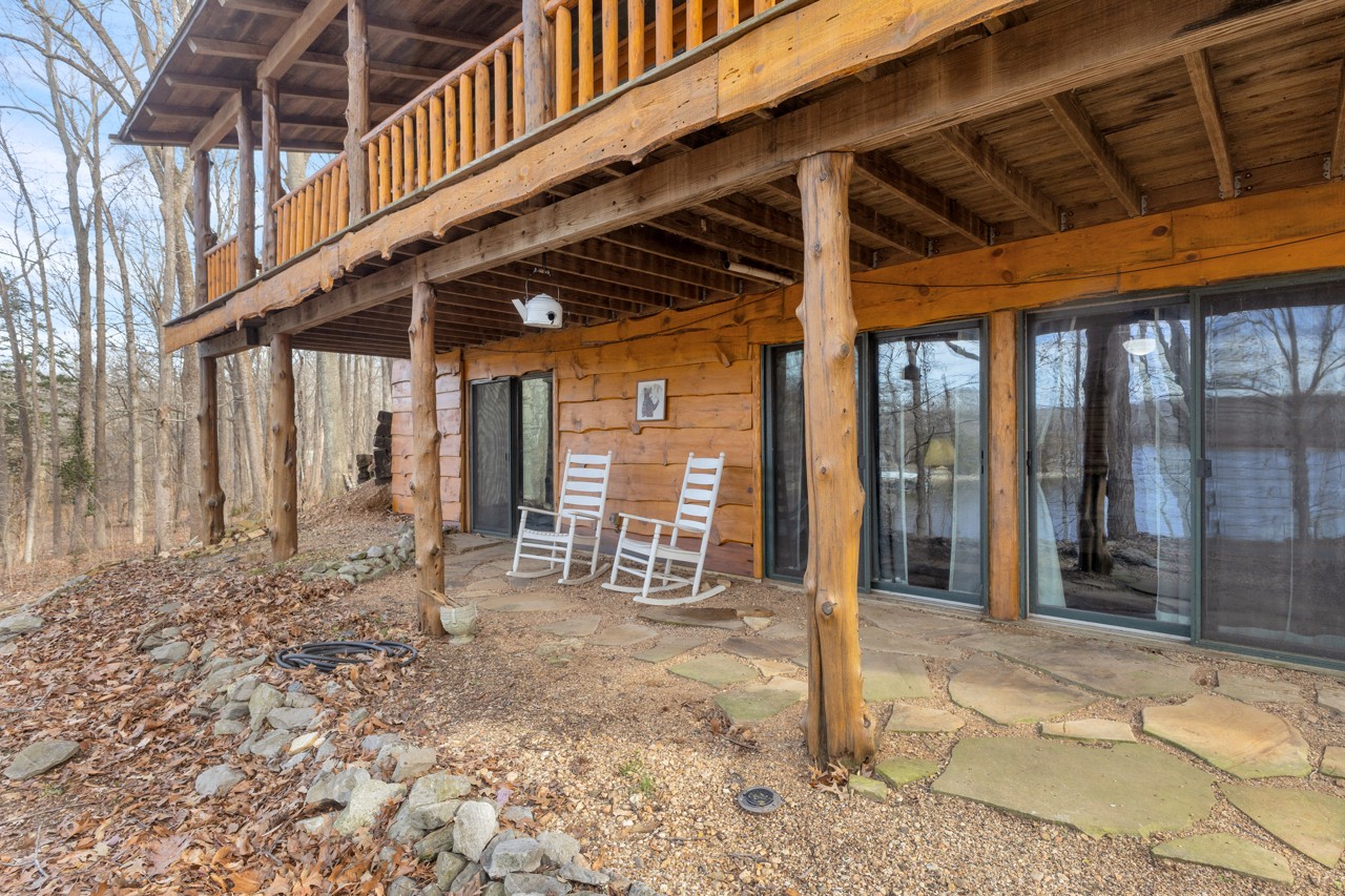 713 Al Henn Road Cadiz, KY 42211 - Photo 30 of 43 a view of a porch with wooden floor