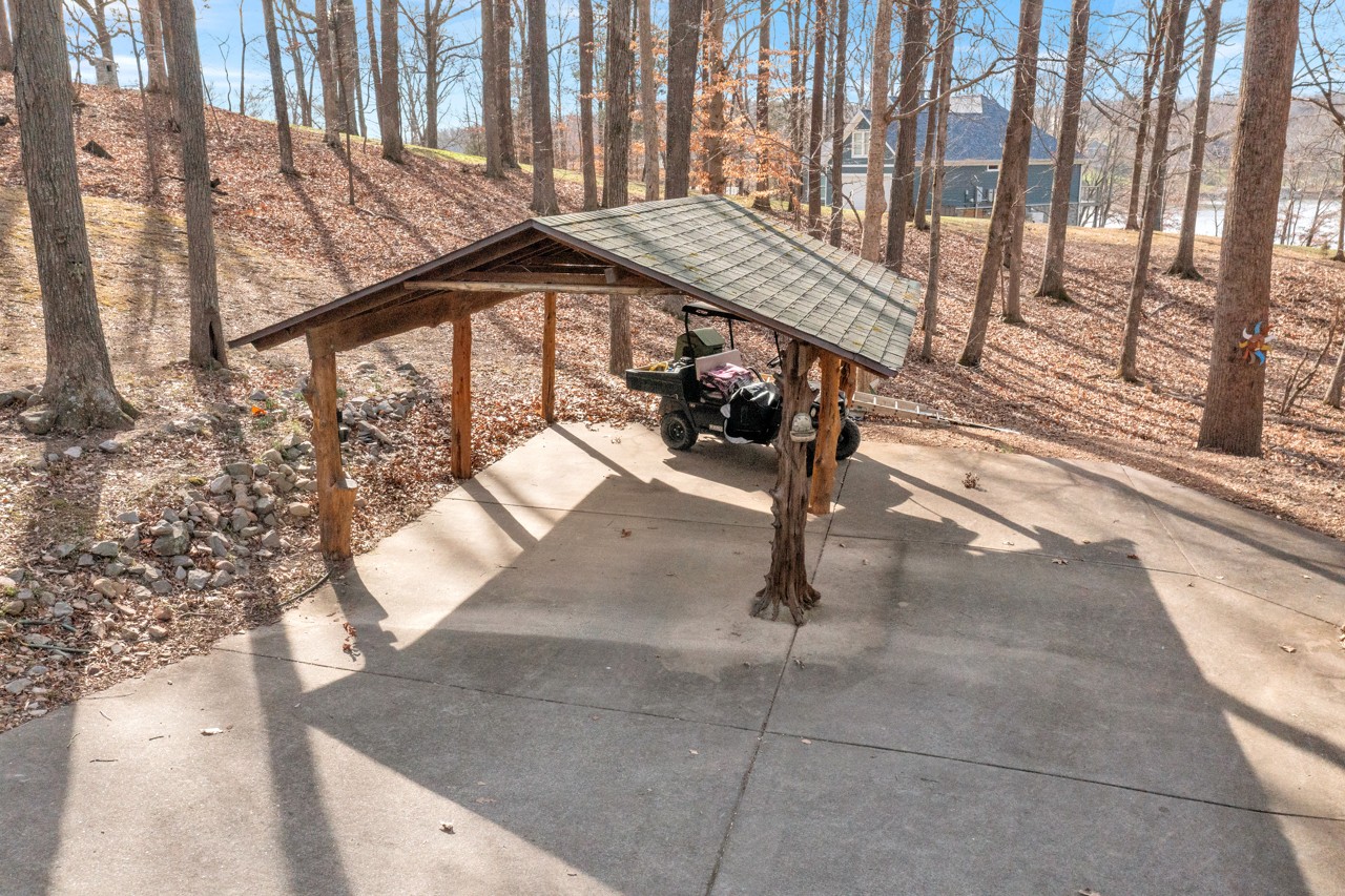 713 Al Henn Road Cadiz, KY 42211 - Photo 35 of 43 a view of staircase with white walls and a window