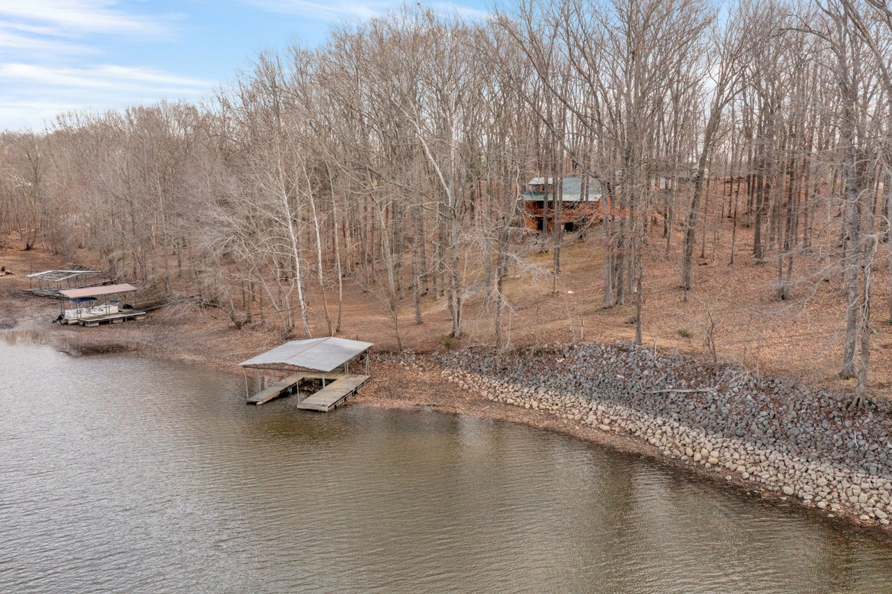 713 Al Henn Road Cadiz, KY 42211 - Photo 38 of 43 a view of a lake with a mountain view