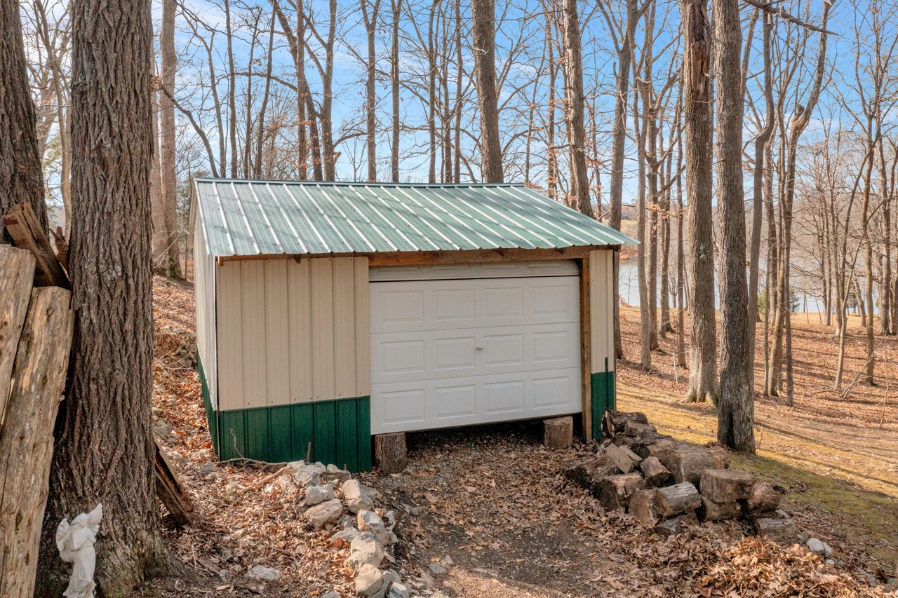 713 Al Henn Road Cadiz, KY 42211 - Photo 39 of 43 a view of a barn in the backyard