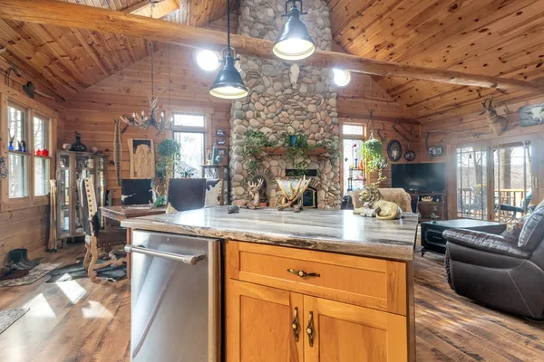 a kitchen with a sink and cabinets