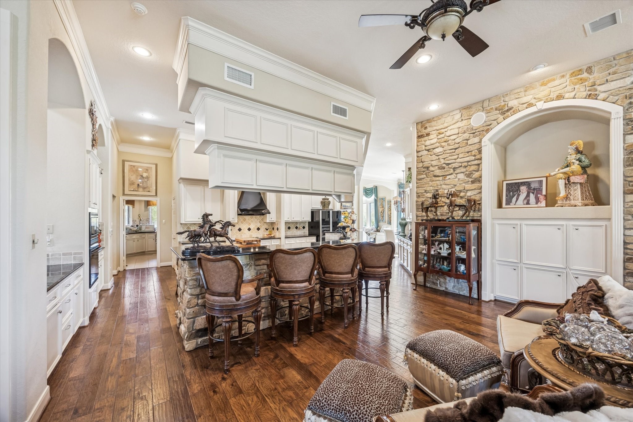 16372 Highway 6 Navasota, TX 77868 - Photo 19 of 49 a view of a dining room with furniture and wooden floor
